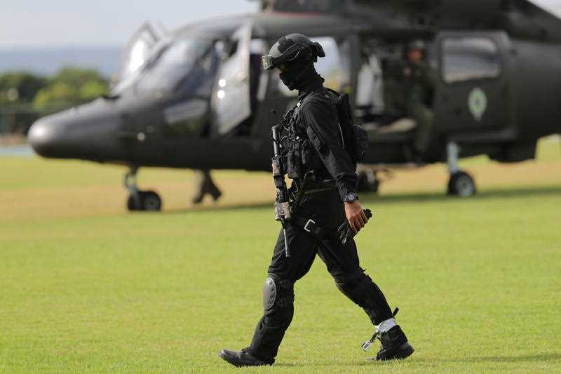 A soldier takes part in an aerial exercise to train to provide security for the Rio 2016 Olympic Games in Brasilia, Brazil, Tuesday, May 17, 2016. Rio de Janeiro will host the Olympics Games in August. A soldier takes part in an aerial exercise to train to provide security for the Rio 2016 Olympic Games in Brasilia, Brazil, Tuesday, May 17, 2016. Rio de Janeiro will host the Olympics Games in August.