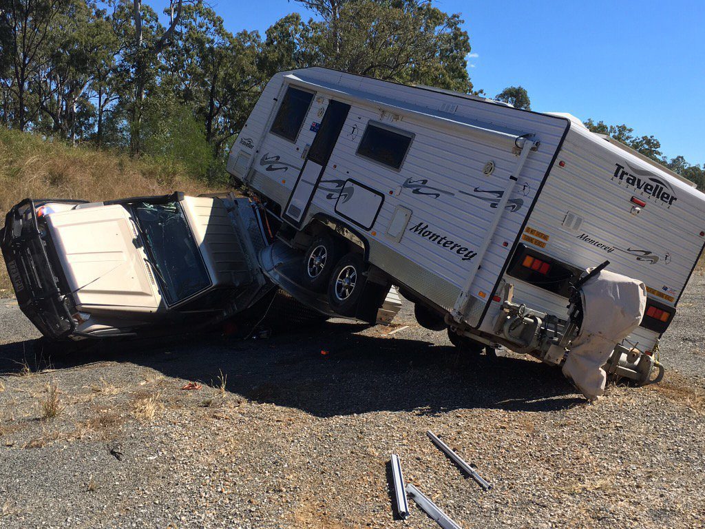 EMERGENCY: 4WD and caravan rollover on Bruce Hwy.Photo Seven News Wide Bay EMERGENCY: 4WD and caravan rollover on Bruce Hwy.Photo Seven News Wide Bay