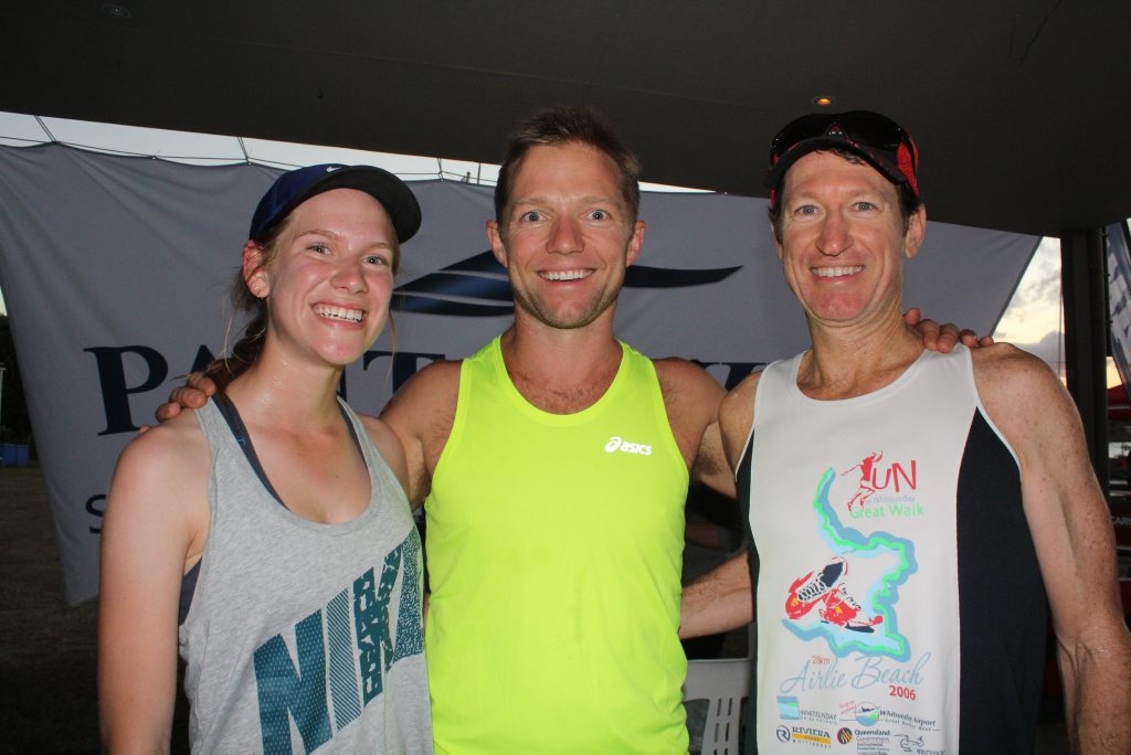 Holly and Peter Moore with Whitsunday Running Club's Tim Oberg (centre) after the race. Photo Peter Carruthers / Whitsunday Times
