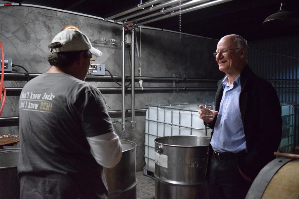 NICE DROP: Dr Lou Muller dropped into Bundaberg to try Waterview's new Pure spirit, made with cane juice, with founder Matthew Drane. Photo: Eliza Goetze / NewsMail NICE DROP: Dr Lou Muller dropped into Bundaberg to try Waterview's new Pure spirit, made with cane juice, with founder Matthew Drane. Photo: Eliza Goetze / NewsMail