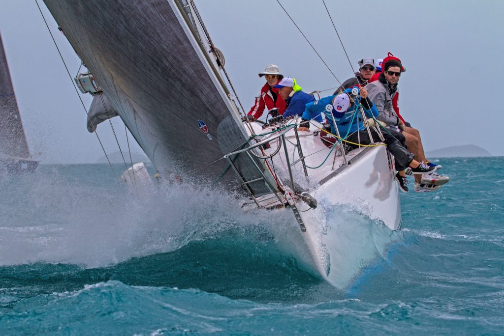 LOCAL HEROES: The crew of Treasure VIII in action on the Airlie Beach Race Week course. Shirley Wodson PhotographyPhoto Contributed