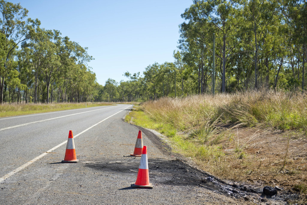 A PILE of black ash, debris and small car parts is all that is left at the scene of a fatal crash that took place along Calliope River Rd last night. A PILE of black ash, debris and small car parts is all that is left at the scene of a fatal crash that took place along Calliope River Rd last night.