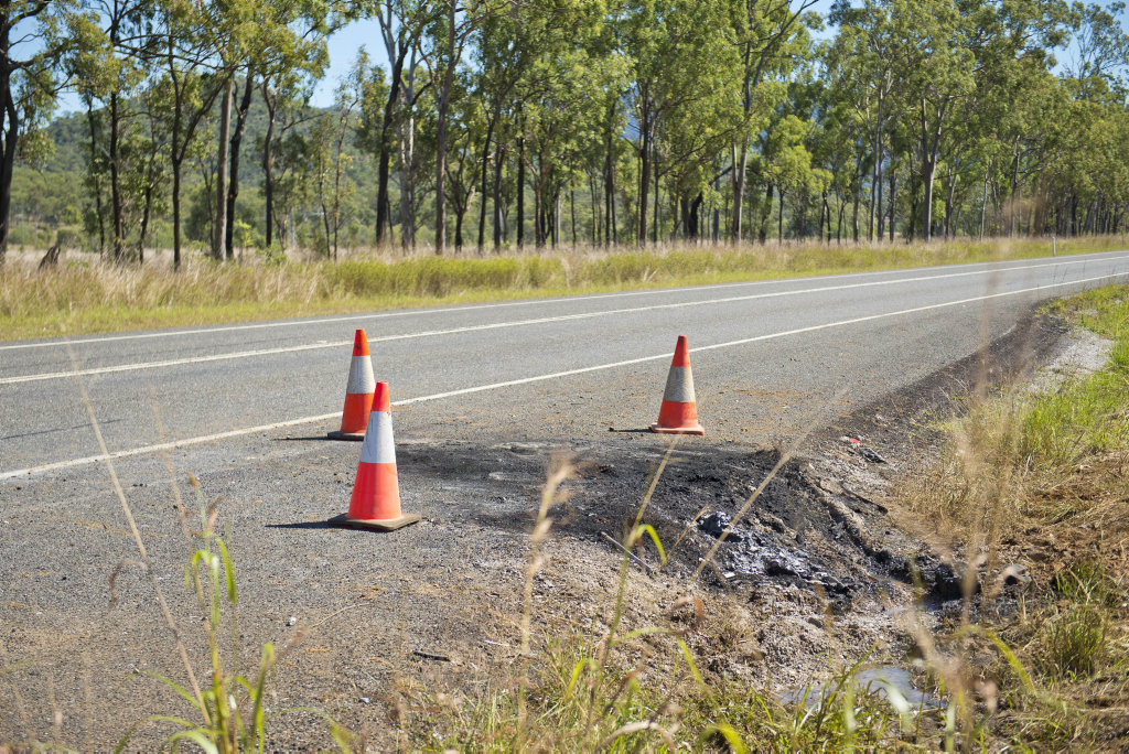 A PILE of black ash, debris and small car parts is all that is left at the scene of a fatal crash that took place along Calliope River Rd last night. A PILE of black ash, debris and small car parts is all that is left at the scene of a fatal crash that took place along Calliope River Rd last night.