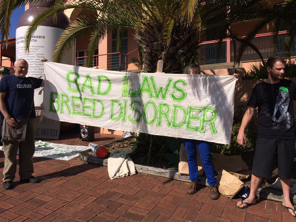 Supporters of the Nimbin Laneboys protest outside Lismore Courthouse on Monday morning. Supporters of the Nimbin Laneboys protest outside Lismore Courthouse on Monday morning.
