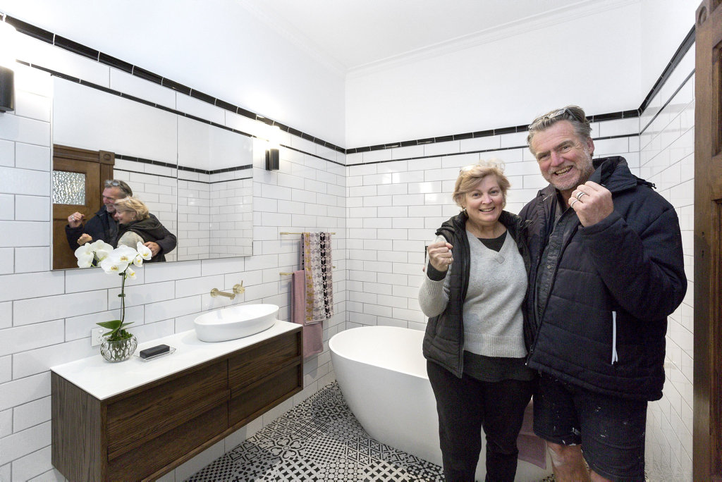 Dan and Carleen in their winning guest bathroom in a scene from The Block. Dan and Carleen in their winning guest bathroom in a scene from The Block.