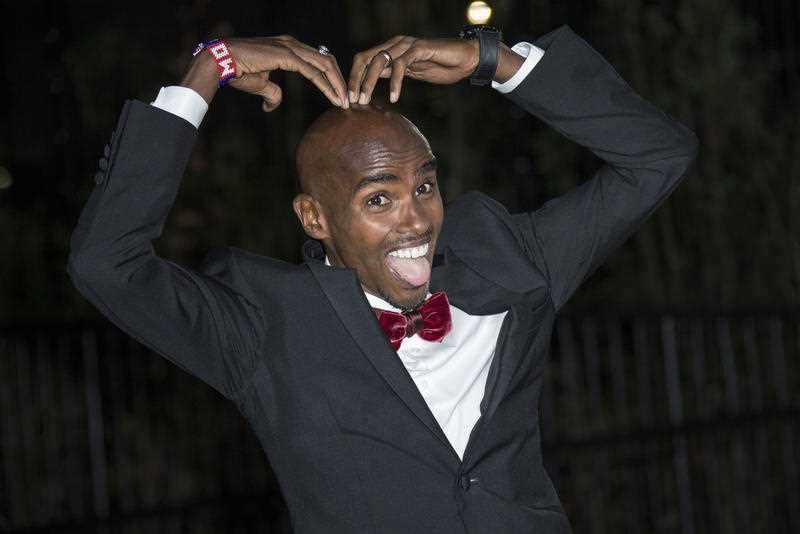 Athlete Mo Farah poses for photographers upon arrival at the GQ magazine Awards at the Tate Modern in London, Tuesday, Sept. 6, 2016. Athlete Mo Farah poses for photographers upon arrival at the GQ magazine Awards at the Tate Modern in London, Tuesday, Sept. 6, 2016.