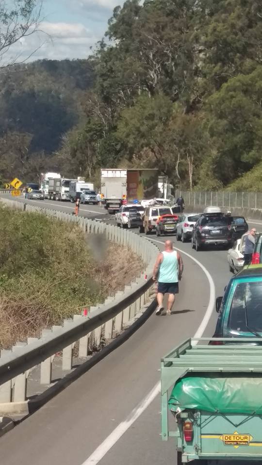 Truck collides with car on Cunningham's Gap. Truck collides with car on Cunningham's Gap.