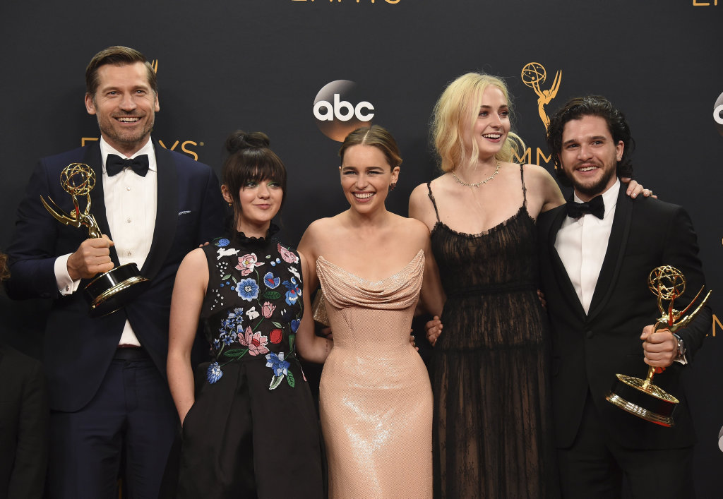 Nikolaj Coster-Waldau, from left, Maisie Williams, Emilia Clarke, Sophie Turner, and Kit Harington winners of the award for outstanding drama series for Game of Thrones pose in the press room at the 68th Primetime Emmy Awards in Los Angeles. Nikolaj Coster-Waldau, from left, Maisie Williams, Emilia Clarke, Sophie Turner, and Kit Harington winners of the award for outstanding drama series for Game of Thrones pose in the press room at the 68th Primetime Emmy Awards in Los Angeles.