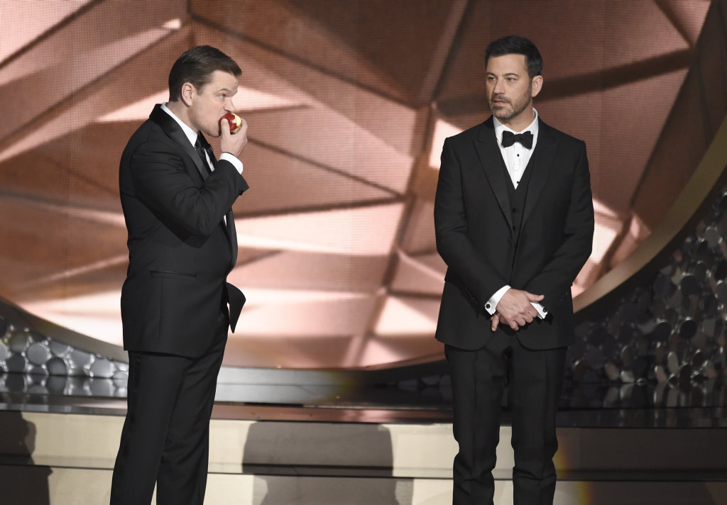 Matt Damon, left, and host Jimmy Kimmel appear on stage at the 68th Primetime Emmy Awards in Los Angeles. Matt Damon, left, and host Jimmy Kimmel appear on stage at the 68th Primetime Emmy Awards in Los Angeles.