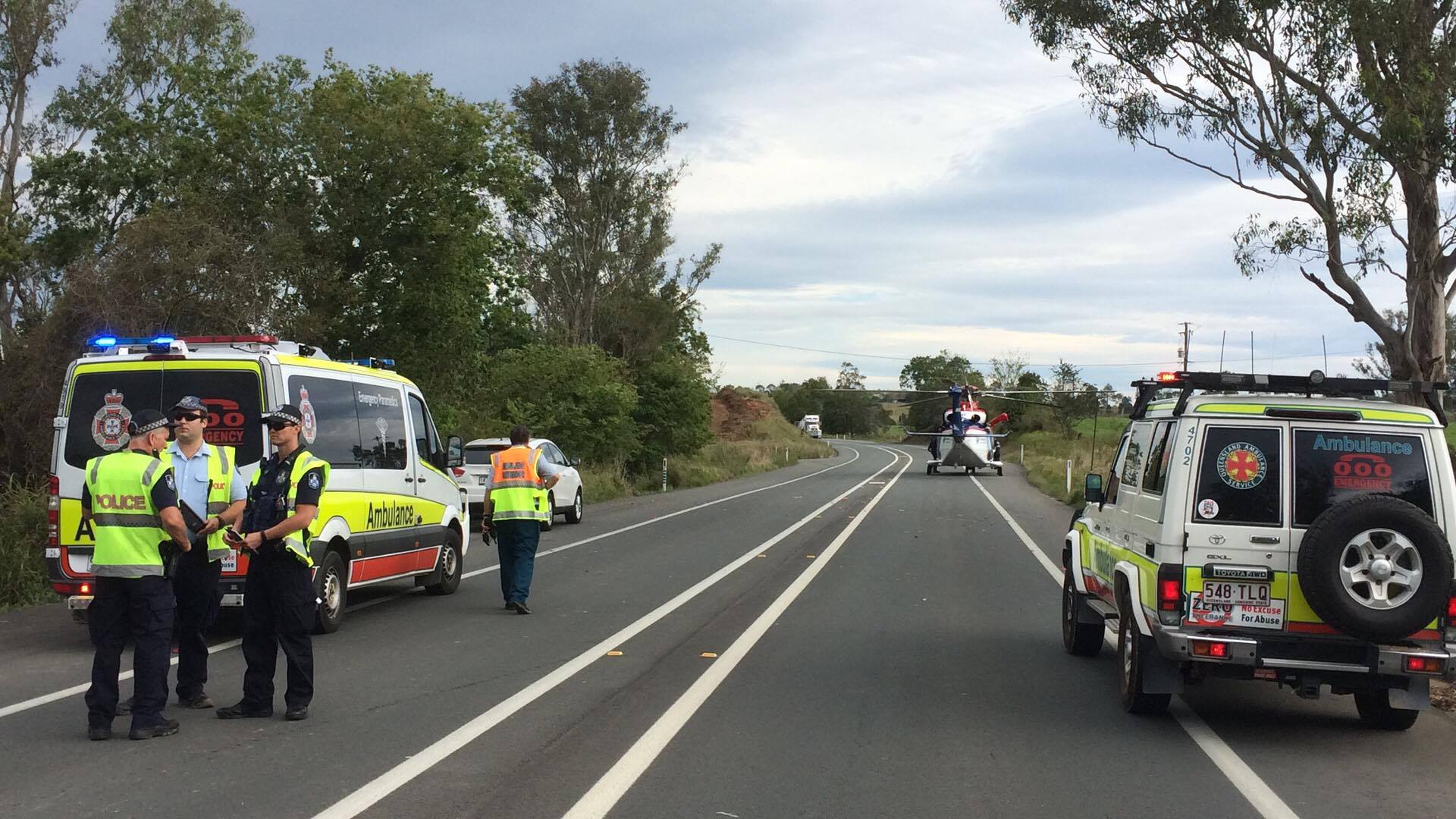 A helicopter lands on the Bruce Hwy to airlift a 47-year-old woman to the Royal Brisbane Hospital. A helicopter lands on the Bruce Hwy to airlift a 47-year-old woman to the Royal Brisbane Hospital.