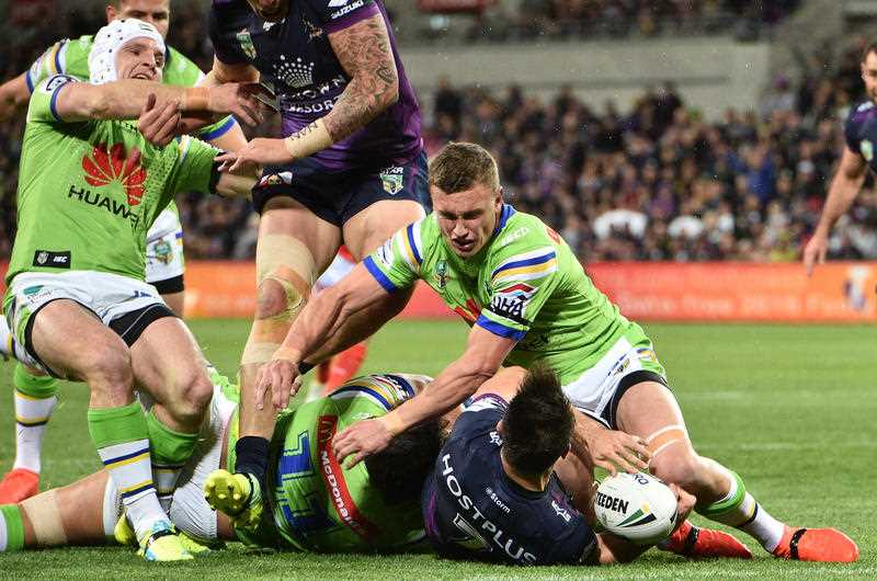 Jarrod Croker (left) of the Raiders is seen injuring his knee during the NRL preliminary final between the Melbourne Storm and the Canberra Raiders at AAMI Park in Melbourne, Saturday, Sept. 24, 2016. Jarrod Croker (left) of the Raiders is seen injuring his knee during the NRL preliminary final between the Melbourne Storm and the Canberra Raiders at AAMI Park in Melbourne, Saturday, Sept. 24, 2016.