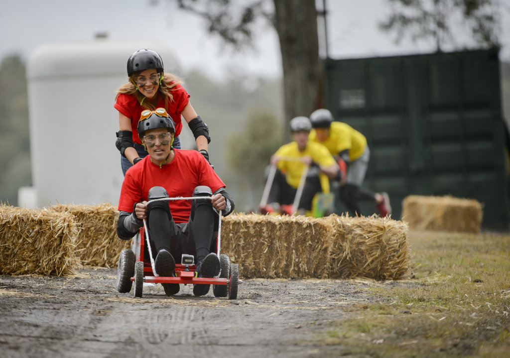Georgia Love and Courtney compete in a billy kart race in a group date planned by Courtney in a scene from The Bachelorette. Georgia Love and Courtney compete in a billy kart race in a group date planned by Courtney in a scene from The Bachelorette.