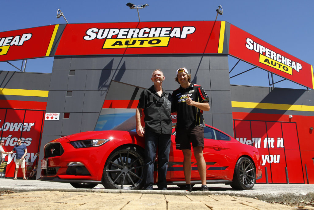 TOP PRIZE: A Prodrive Racing-modified Ford Mustang GT was won by Mark Trembath of Mountain Creek (left) as part of a Supercheap Auto and Castrol promotion. The prize was given to Mark at Supercheap Kawana by Supercars driver Chaz Mostert (right). TOP PRIZE: A Prodrive Racing-modified Ford Mustang GT was won by Mark Trembath of Mountain Creek (left) as part of a Supercheap Auto and Castrol promotion. The prize was given to Mark at Supercheap Kawana by Supercars driver Chaz Mostert (right).