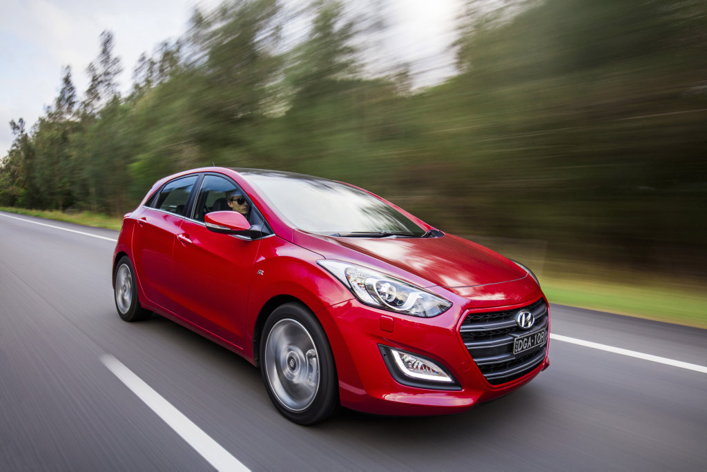 THE WARM ONE: Hyundai's perennial favourite i30 hatch gets loaded with goodies and sporty style in SR guise. THE WARM ONE: Hyundai's perennial favourite i30 hatch gets loaded with goodies and sporty style in SR guise.