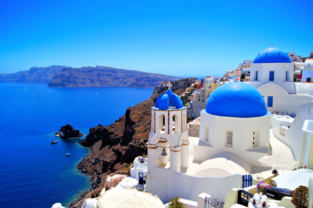 The breathtaking views and stunning blue domes for which Santorini is known. The breathtaking views and stunning blue domes for which Santorini is known.