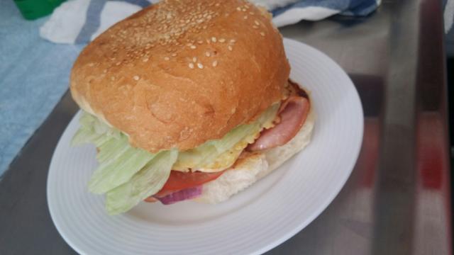 BLET burger with onion. BLET burger with onion.