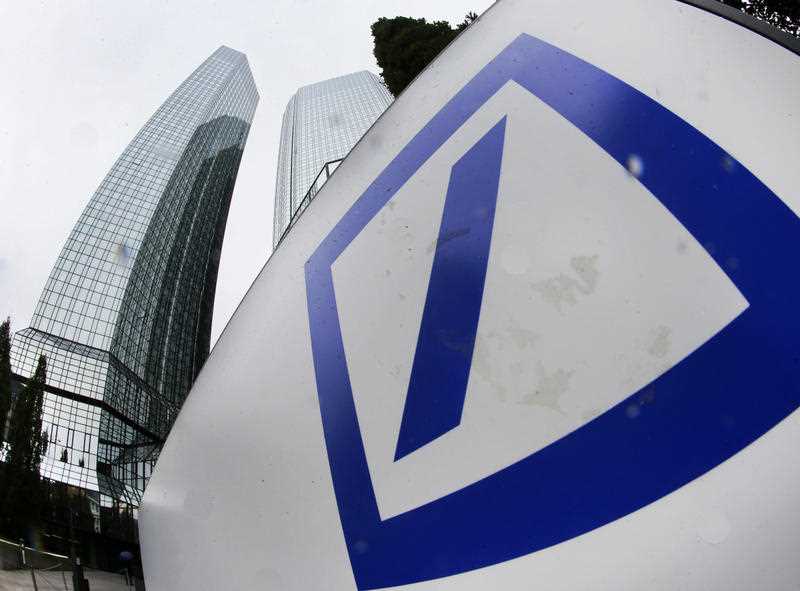 The bank's logo is seen at the headquarters of Deutsche Bank in Frankfurt, Germany, Friday, Sept. 30, 2016. The bank's logo is seen at the headquarters of Deutsche Bank in Frankfurt, Germany, Friday, Sept. 30, 2016.