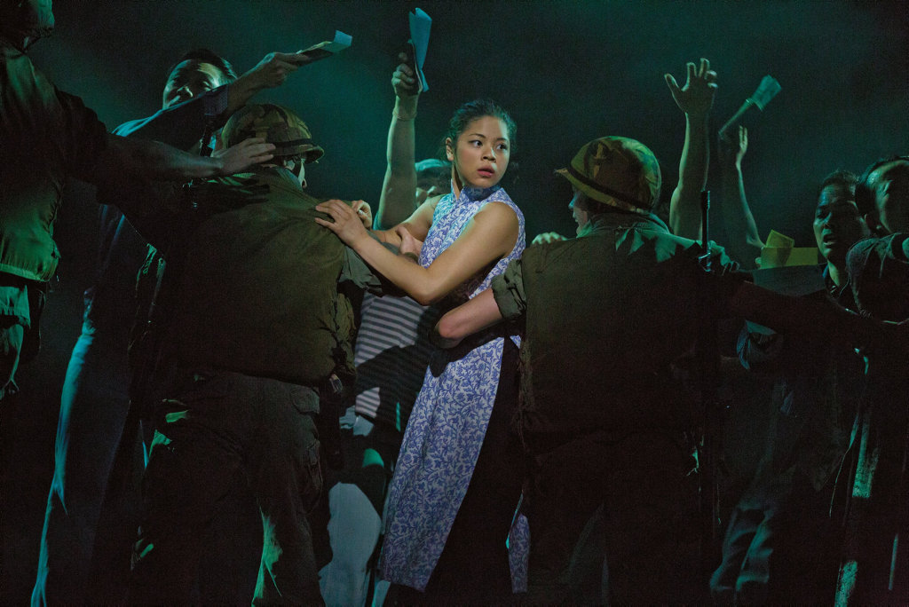 Eva Noblezada as Kim in a scene from the movie Miss Saigon. Eva Noblezada as Kim in a scene from the movie Miss Saigon.