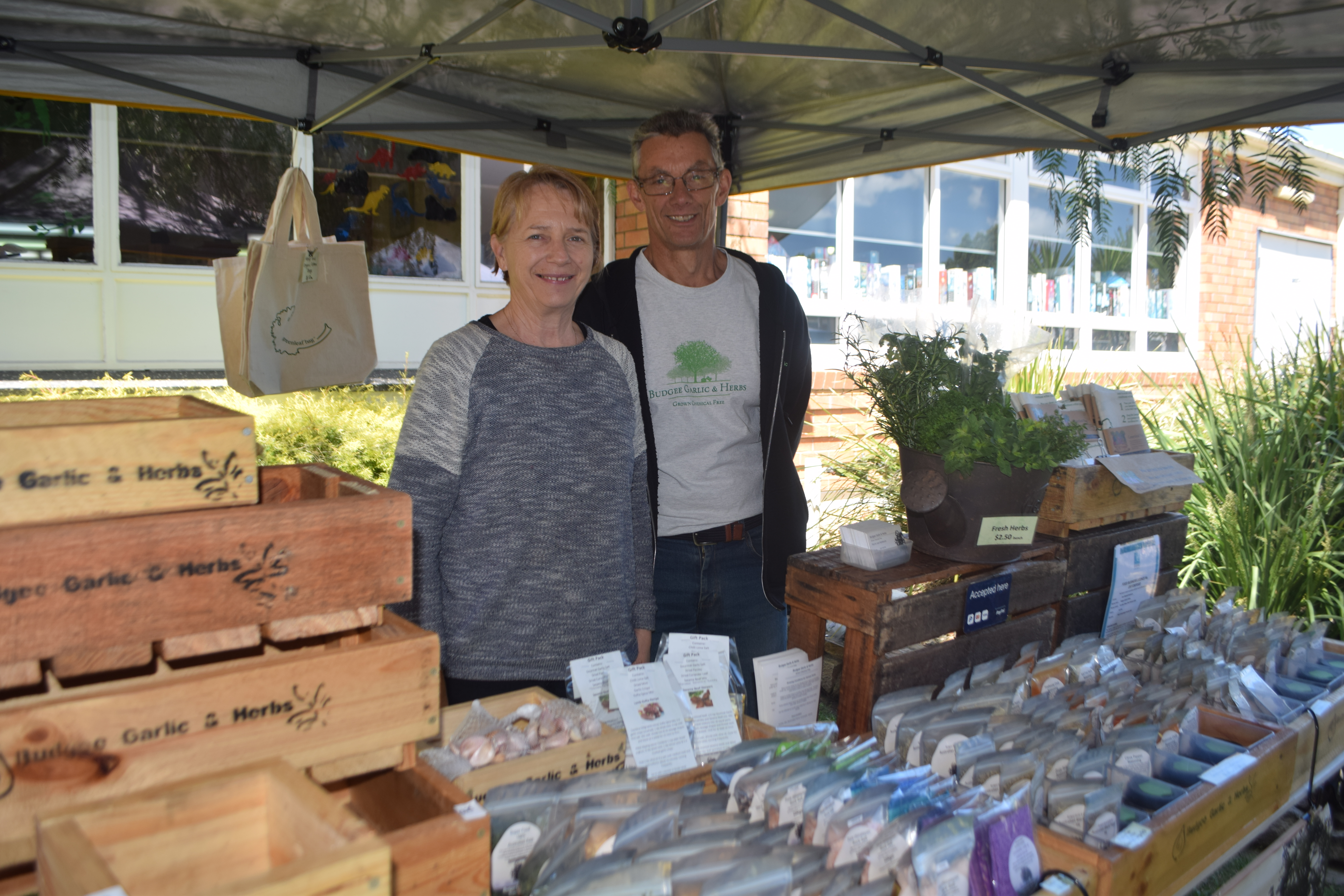 Joan and Rod Kambouris from Budgee Garlic and Herbs with their stall at the Seasonal Feast markets.