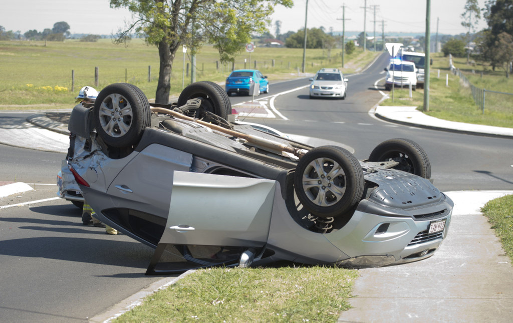 Two car traffic crash at Glenvale Rd and Greenwattle st roundabout resulting in one car rolling onto its roof. Sunday Oct 16, 2016. Two car traffic crash at Glenvale Rd and Greenwattle st roundabout resulting in one car rolling onto its roof. Sunday Oct 16, 2016.