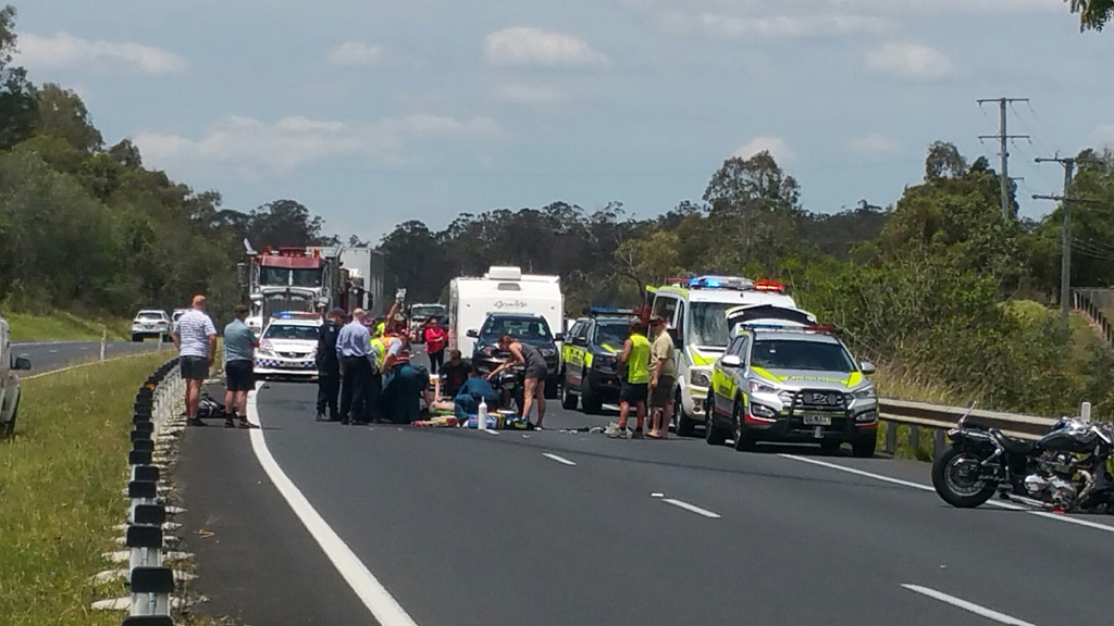 Emergency services at the scene of a motorcycle crash on the west-bound lanes of the Warrego Hwy at Blacksoil. Emergency services at the scene of a motorcycle crash on the west-bound lanes of the Warrego Hwy at Blacksoil.