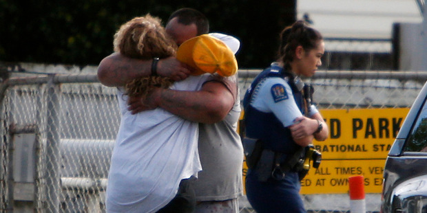 People console each other outside St John Ambulance Whangarei in Kensington, after a critically injured man died. People console each other outside St John Ambulance Whangarei in Kensington, after a critically injured man died.