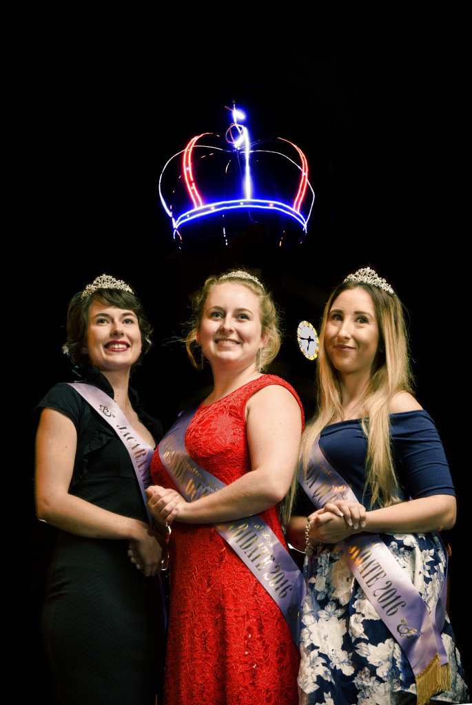 2016 Jacaranda candidates Sharni Wren, Heidi Madsen and Shannon Carter in front of the lit up Jacaranda Crown that was placed on top of the clocktower in preparation for the festival. 2016 Jacaranda candidates Sharni Wren, Heidi Madsen and Shannon Carter in front of the lit up Jacaranda Crown that was placed on top of the clocktower in preparation for the festival.