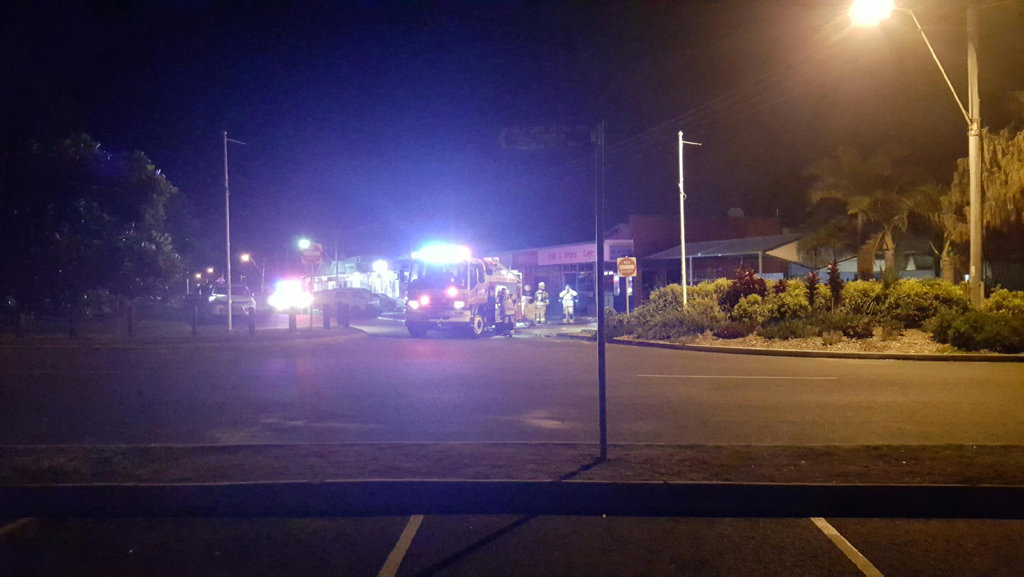 Firefighters at the scene of a fire that destroyed the inside of Rainbow Beach cafe, the Coloured Sands Cafe on Tuesday night. Firefighters at the scene of a fire that destroyed the inside of Rainbow Beach cafe, the Coloured Sands Cafe on Tuesday night.
