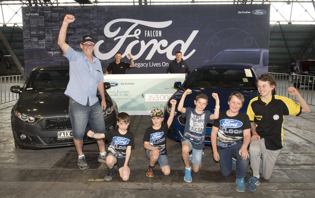 Auction winners with the final Ford Falcons prodcued in Australia.Photo: Contributed Auction winners with the final Ford Falcons prodcued in Australia.Photo: Contributed