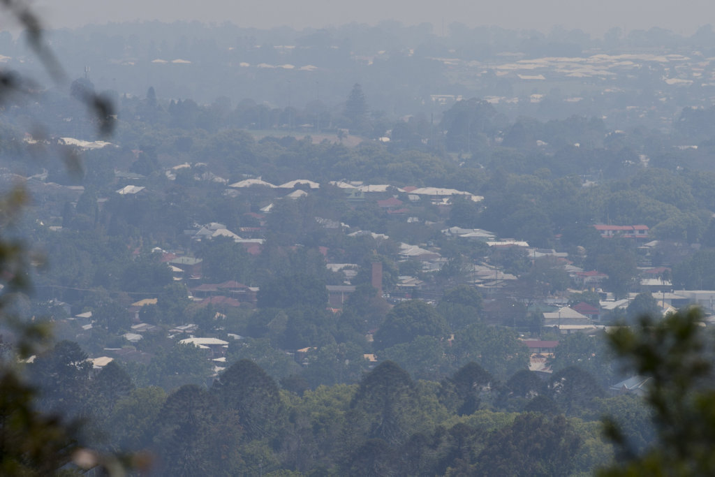 Haze blankets Toowoomba viewed from Mount Lofty lookout caused by fire at Ravensbourne, Sunday, October 30, 2016. Haze blankets Toowoomba viewed from Mount Lofty lookout caused by fire at Ravensbourne, Sunday, October 30, 2016.