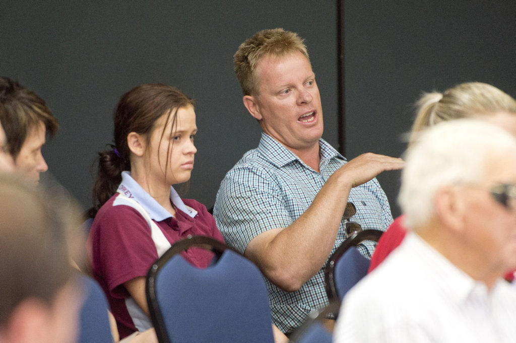 Brad Hudson is a horse trainer in Oakey with daughter Amba . Oakey residents hear from members of the Australian Defence Force on water contamination concerns . Friday, Dec 04, 2015 . Photo Nev Madsen / The Chronicle Brad Hudson is a horse trainer in Oakey with daughter Amba . Oakey residents hear from members of the Australian Defence Force on water contamination concerns . Friday, Dec 04, 2015 . Photo Nev Madsen / The Chronicle