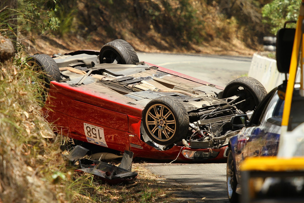 OVERTURNED: 2004 BMW M3 suffers massive damage after rolling at the 2016 Noosa Hill Climb. OVERTURNED: 2004 BMW M3 suffers massive damage after rolling at the 2016 Noosa Hill Climb.