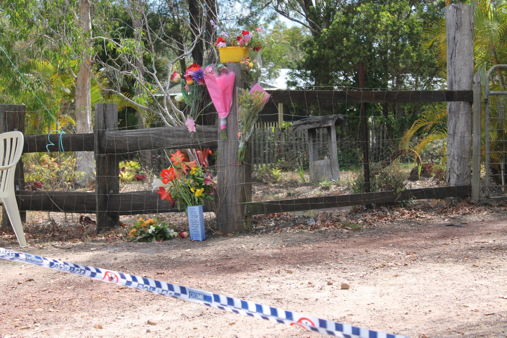 GRIEF: Flowers and messages of love left for the three victims at the scene of a domestic shooting on River Heads Rd, Booral. GRIEF: Flowers and messages of love left for the three victims at the scene of a domestic shooting on River Heads Rd, Booral.