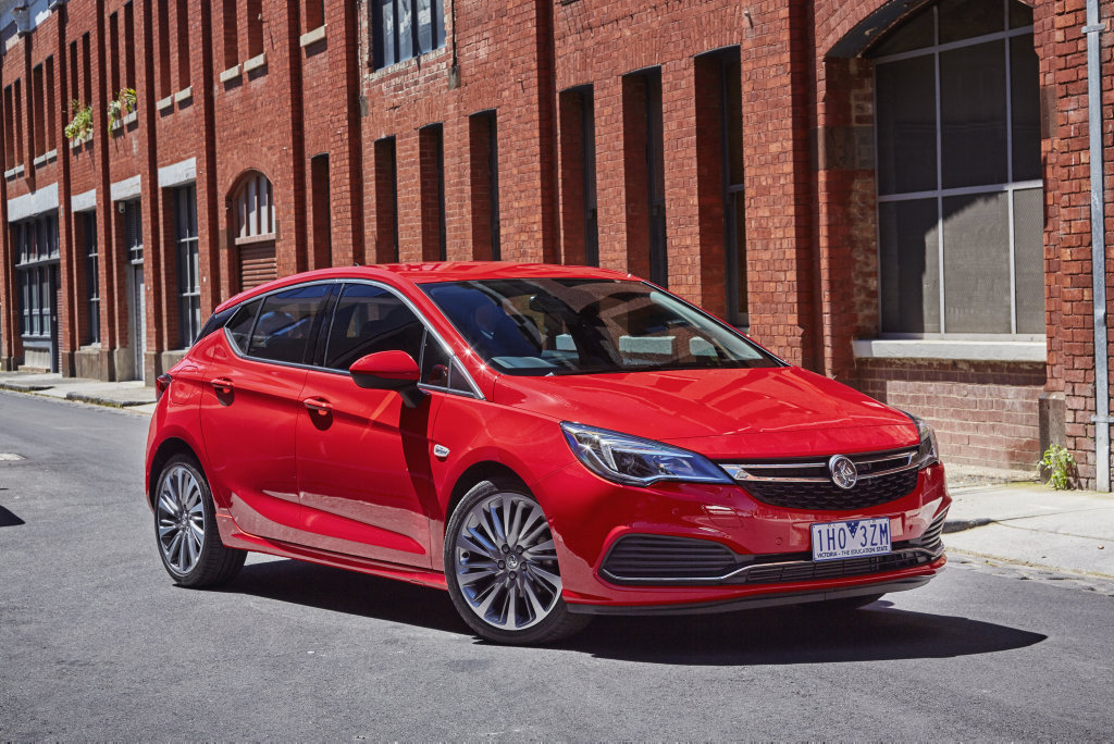 EURO CHARMS: 2017 Holden Astra arrives in three specs and with choice of two turbocharged petrol engines. Entry level R costs $21,990 before on-road costs, and features standard kit including 17-inch alloys, rear camera, Apple CarPlay & Android Auto and digital radio. EURO CHARMS: 2017 Holden Astra arrives in three specs and with choice of two turbocharged petrol engines. Entry level R costs $21,990 before on-road costs, and features standard kit including 17-inch alloys, rear camera, Apple CarPlay & Android Auto and digital radio.