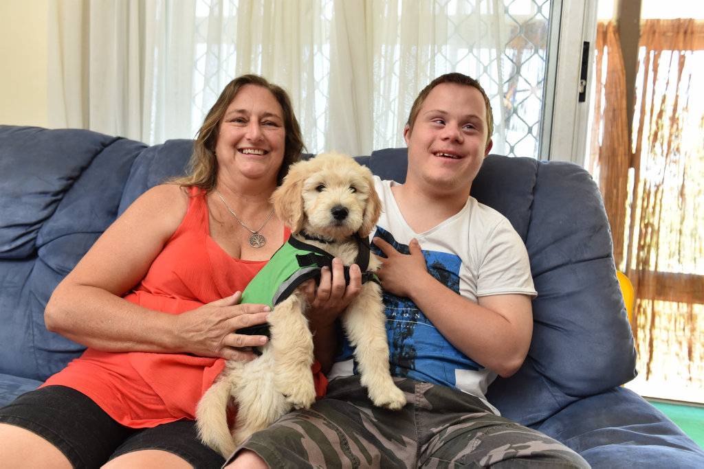 Deanne Scottt and her son, Ashlee Roberson,17, with his diabetic alert service dog, Kai. Deanne Scottt and her son, Ashlee Roberson,17, with his diabetic alert service dog, Kai.