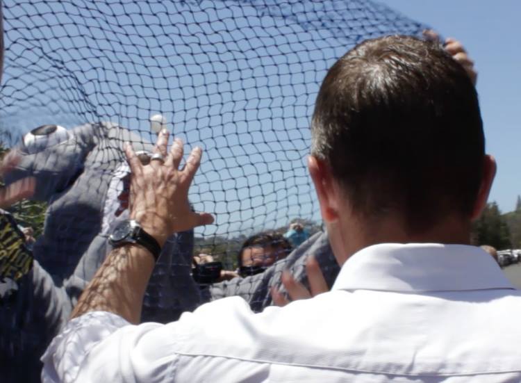 Dean Jefferys tries to net Premier Mike Baird on Friday at Ballina. Dean Jefferys tries to net Premier Mike Baird on Friday at Ballina.
