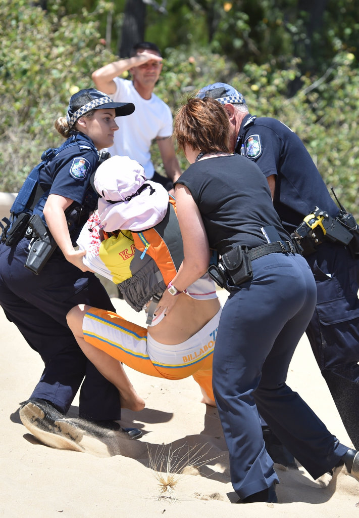 Super boat protest at Scarness Beach - Linda Hill is arrested by police. Super boat protest at Scarness Beach - Linda Hill is arrested by police.