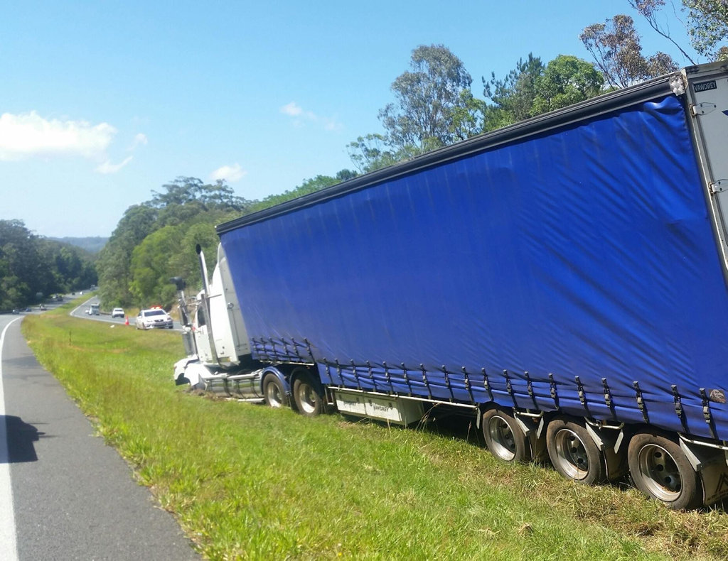 A truck crashed into the Bruce Hwy median strip at Kiels Mountain. A truck crashed into the Bruce Hwy median strip at Kiels Mountain.