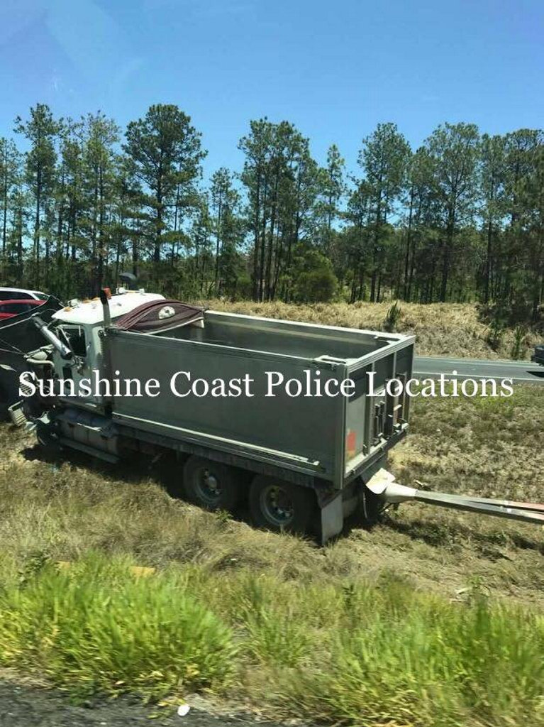 A truck and a 4WD towing a caravan crashed on the Bruce Hwy at Bells Creek. A truck and a 4WD towing a caravan crashed on the Bruce Hwy at Bells Creek.