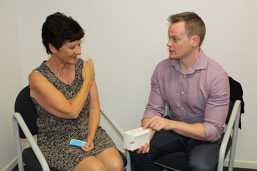 TECHNIQUE: Golden Beach Medical Centre's Dr Peter De Wet (right) explains to USC Clinical Trials Centre research coordinator Jo McFarland how the cannabidiol is applied to the shoulder. TECHNIQUE: Golden Beach Medical Centre's Dr Peter De Wet (right) explains to USC Clinical Trials Centre research coordinator Jo McFarland how the cannabidiol is applied to the shoulder.