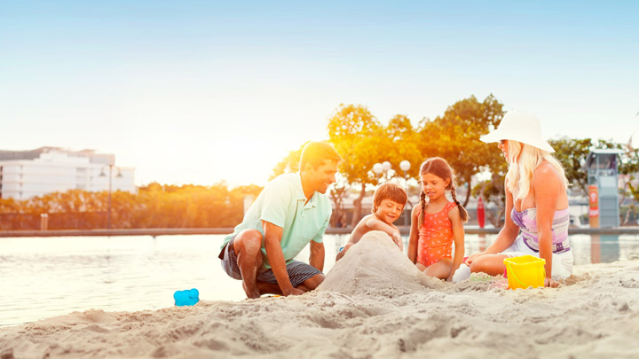 See how this family is not under the shade of a beach umbrella? That's because they're banned.