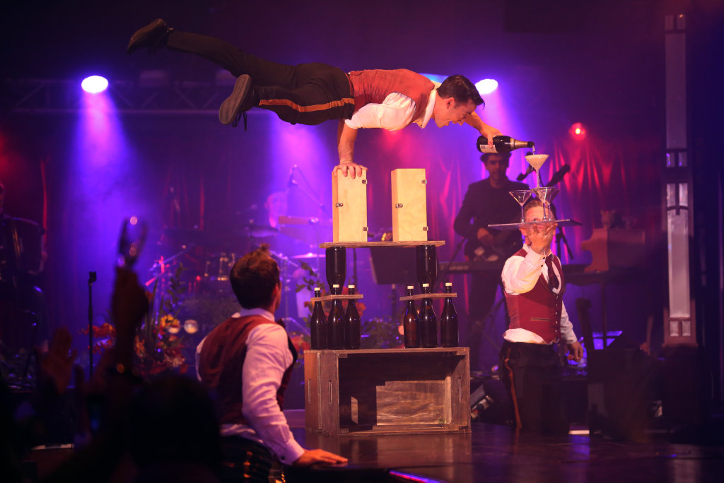 The deftly dexterous Swizzle Boys will serve your drinks while planking. The deftly dexterous Swizzle Boys will serve your drinks while planking.