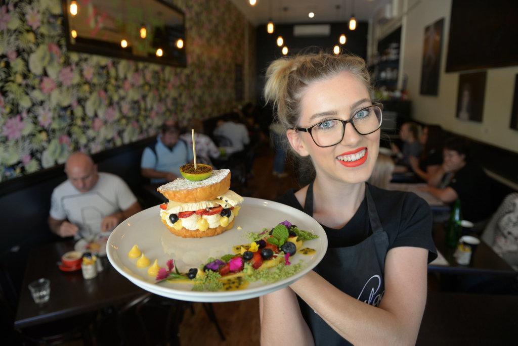 INDULGE YOURSELF: Emma Giovannoni serves up a fresh dish at Indulge. The cafe has just won Brisbane Times Good Food Guide 2016 People's Choice award. INDULGE YOURSELF: Emma Giovannoni serves up a fresh dish at Indulge. The cafe has just won Brisbane Times Good Food Guide 2016 People's Choice award.