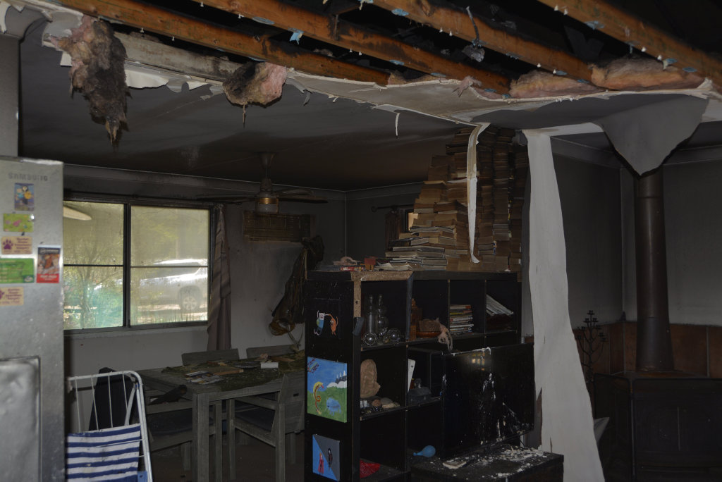 Chris Ramsay and Trent Campbell's Murphys Creek home burnt down on Saturday night due to their Samsung washing machine exploding. Chris Ramsay and Trent Campbell's Murphys Creek home burnt down on Saturday night due to their Samsung washing machine exploding.