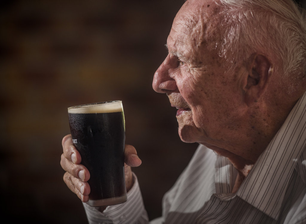 Doug Lewis enjoys a beer with his family and friends celebrating his 100th birthday at his regular haunt the Lawrence Tavern. Doug Lewis enjoys a beer with his family and friends celebrating his 100th birthday at his regular haunt the Lawrence Tavern.
