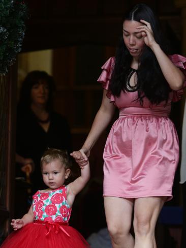 Lindt Cafe siege survivor Harriette Denny with daughter Billie at the Sydney Siege anniversary memorial on Thursday. Lindt Cafe siege survivor Harriette Denny with daughter Billie at the Sydney Siege anniversary memorial on Thursday.