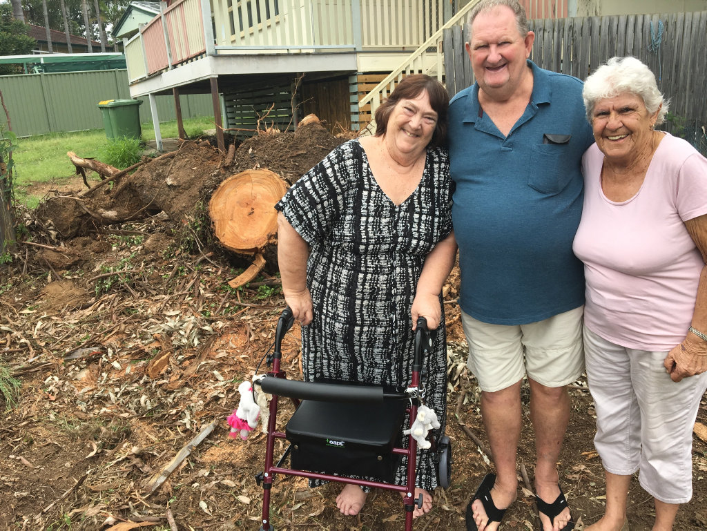 John and Judy-Ann Smith with their neighbour Marlene whose washing line was destroyed when a huge tree came crashing down in the storm. John and Judy-Ann Smith with their neighbour Marlene whose washing line was destroyed when a huge tree came crashing down in the storm.