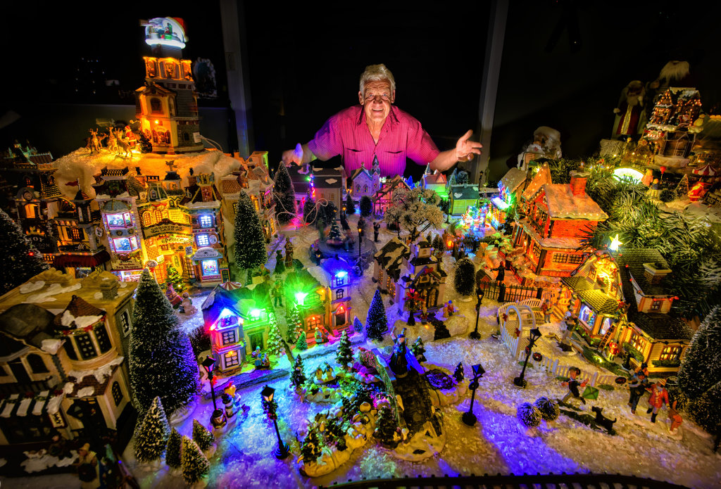 Peter Munro of Woodford Island shows off part of the large Christmas display they have setup in their house.