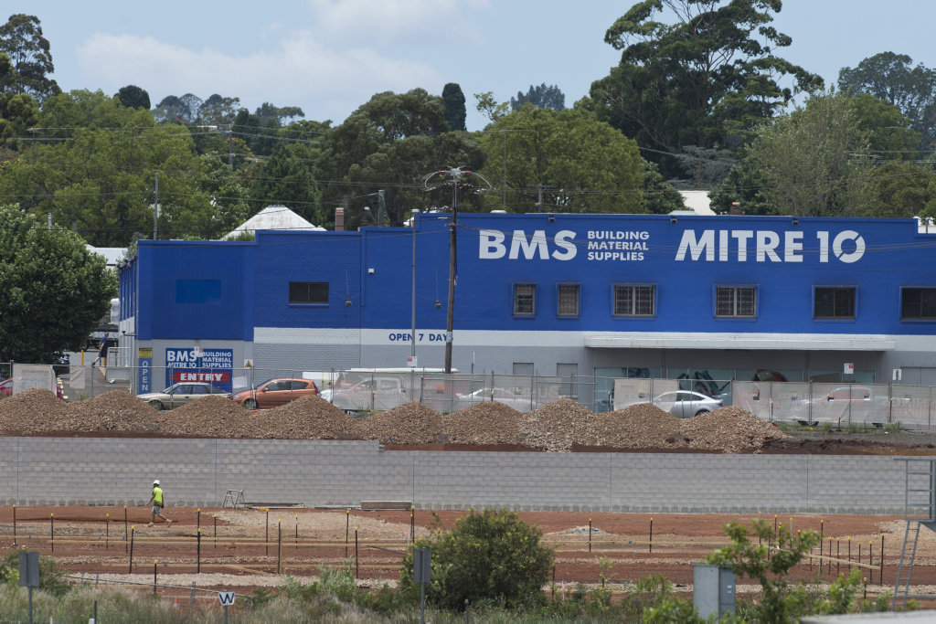 The BMS Mitre 10 store can be seen over the progress of the construction of new Bunnings store on Ruthven St, Wednesday, December 21, 2016. The BMS Mitre 10 store can be seen over the progress of the construction of new Bunnings store on Ruthven St, Wednesday, December 21, 2016.