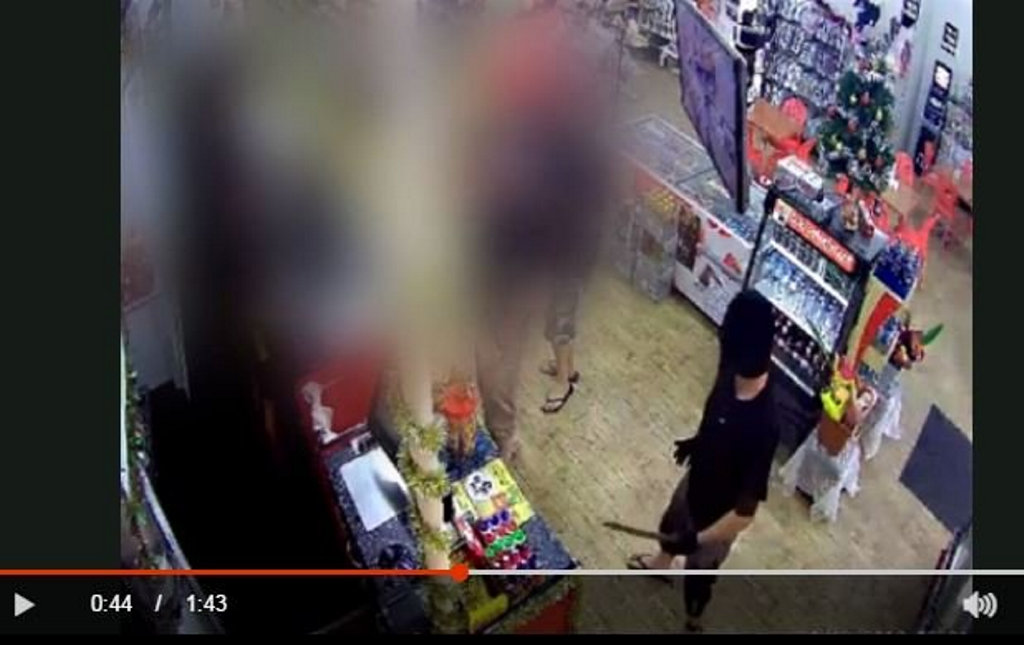 CCTV footage shows the terrifying moment a Glenwood service station was robbed in broad daylight. CCTV footage shows the terrifying moment a Glenwood service station was robbed in broad daylight.